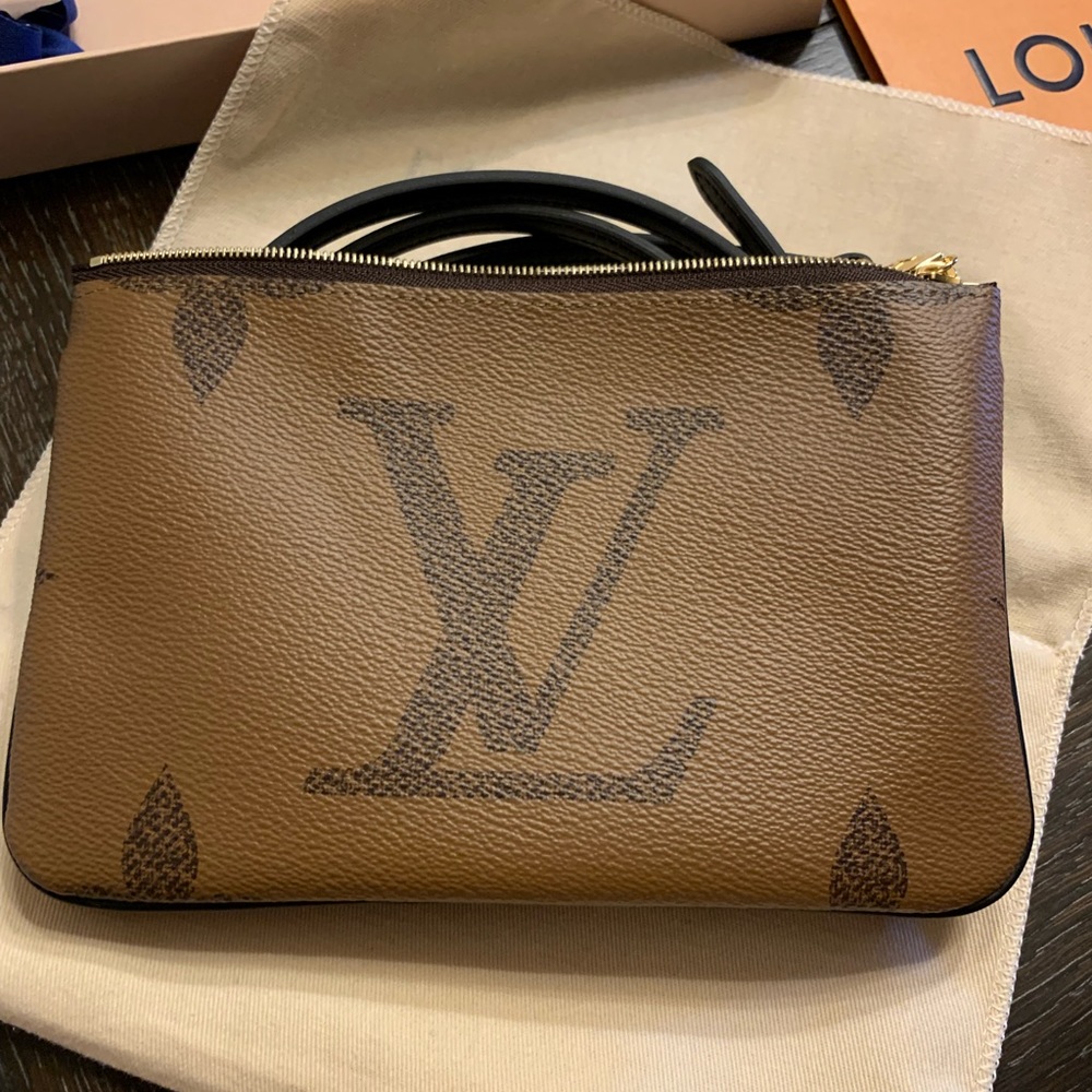 Reverse monogram Pochette
